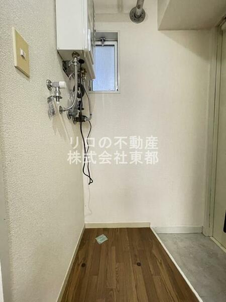 画像15:洗濯機置き場は室内にあるので雨に濡れる心配はありません。