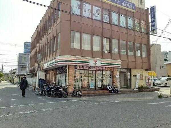 画像16:セブンイレブン阪急東園田駅店様まで９０ｍ