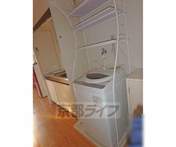 画像12:洗濯機とラックです。