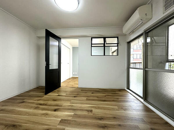 画像4:台所と洋室６畳とは引違い扉でセパレートもオープンにも自由なスタイルで住めます。
