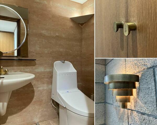 画像10:トイレ｜ディテール｜トイレはホテルライクなつくり。真鍮風の取っ手や照明もいい味を出しています。