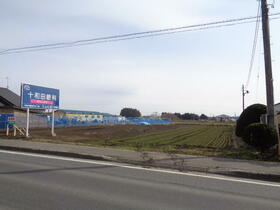 青森県十和田市大字三本木字西金崎