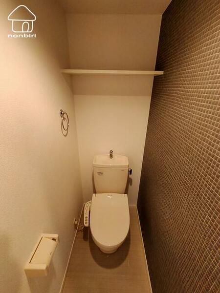 画像10:トイレのアクセントクロスがポイントです