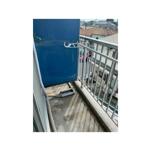 暖かな日差しのふりそそぐバルコニー