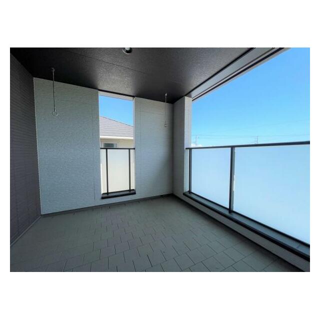 寝室と繋がるバルコニーは、津軽富士・岩木山の絶景を独り占めできる特等席。