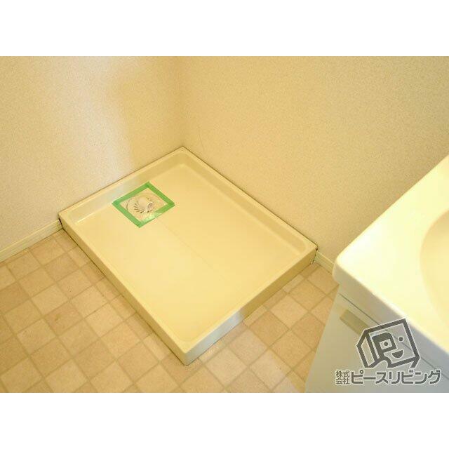 洗面所には洗濯機置場。