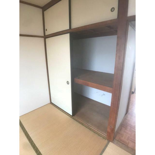 押入
