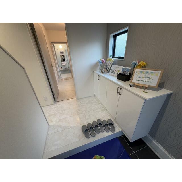 開ければ広がる、閉じれば落ち着く玄関（1号棟）