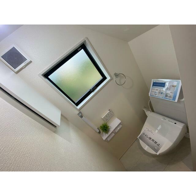 お気に入りのカバーやマット、スリッパを置いて快適空間に（1号棟）