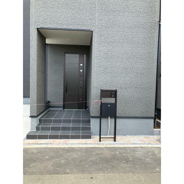 開ければ広がる、閉じれば落ち着く玄関（3号棟）