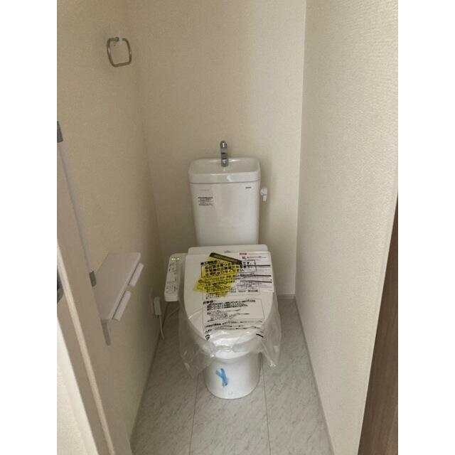 お気に入りのカバーやマット、スリッパを置いて快適空間に（6号棟）