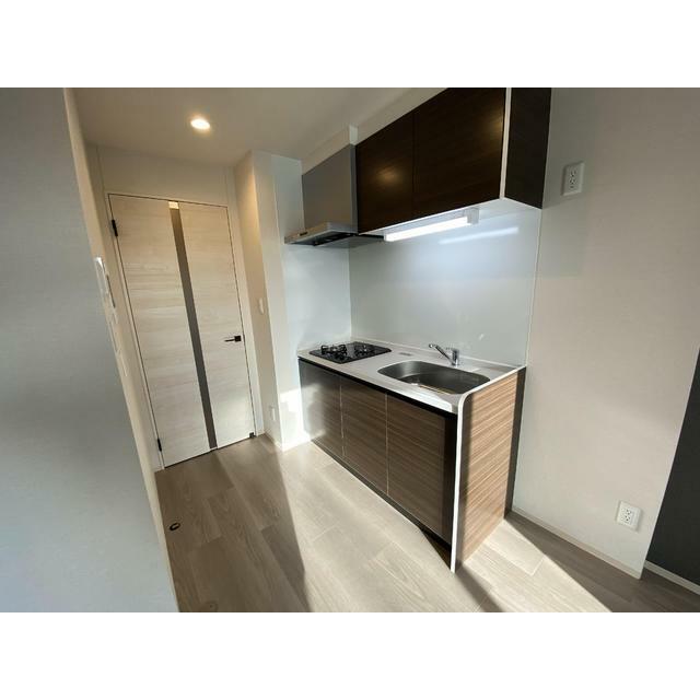 人工大理石の天板が高級感を演出するシステムキッチン。人工大理石の天板が高級感を演出するシステムキッチン。