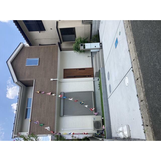 １号棟　外観完成写真 お日様や風、地面と対話ができる場所があるお家