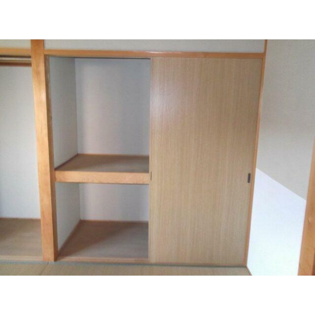押入