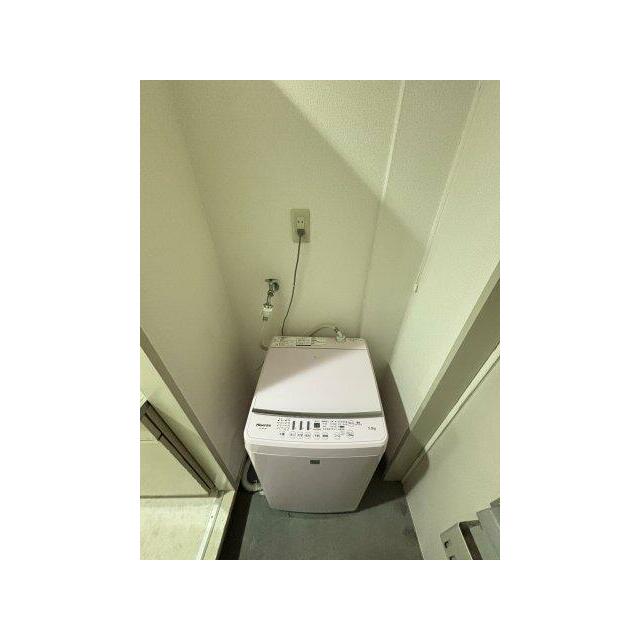 洗濯機点き
