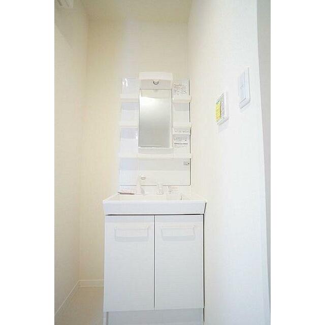 洗面台　洗髪洗面化粧台を採用。