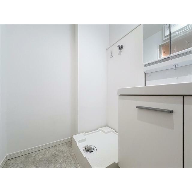 洗濯機は洗面台の隣に置けます