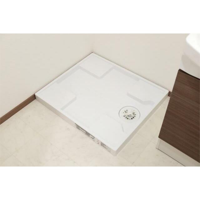 洗濯機パンを設置。水漏れのリスクを軽減し、洗面所を清潔に保てます。